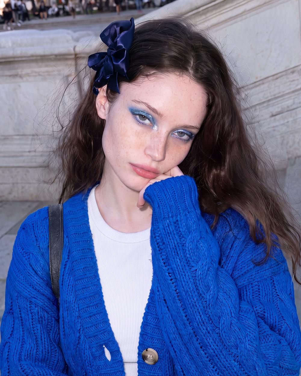 Blue cardigan, blue eyeshadow